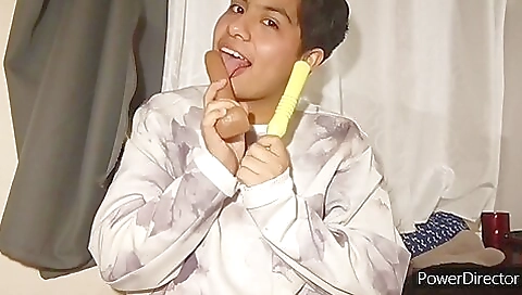 Amateur brunette in a black top masturbates with two sex toys