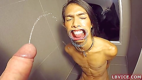 Beautiful girl with a sexy body enjoys pissing on her penis